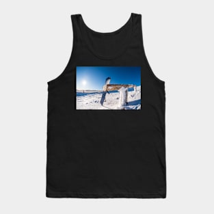 Snowboard leaning on a wood rail Tank Top